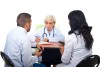 woman_man_sitting_with_doctor